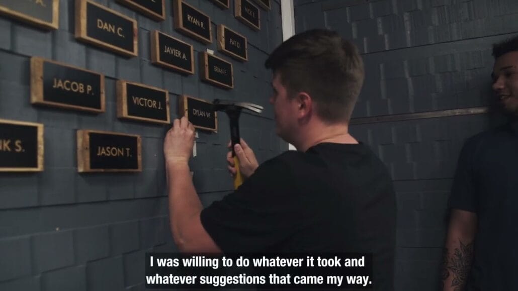 dylan w adding his name to the wall